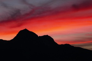 Sunset Mountains Red Sky 5k (1336x768) Resolution Wallpaper