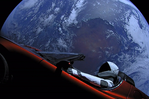 Tesla Roadster In Space With Space Suit Man