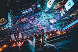Time Square Aerial View Man Siting At Top 5k (1336x768) Resolution Wallpaper