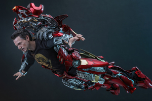 Tony Stark Suits Up As Iron Man Wallpaper