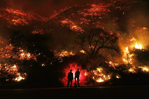 Two Man Standing In Front Of Forest Fire (5120x2880) Resolution Wallpaper
