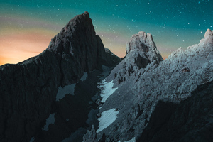 Vibrant Evening Sky Rocks Mountains 4k Wallpaper