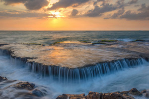 Water Cascades Over An Ancient Coral Reef 5k (2048x1152) Resolution Wallpaper