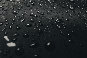Water Drops On Black Surface 4k Wallpaper