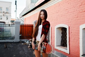 Women Wearing Shirt With Skateboard Outdoors (2560x1440) Resolution Wallpaper