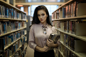 Women With Books In Library (2048x1152) Resolution Wallpaper