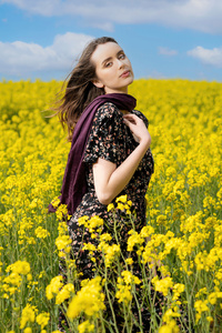 A Girl Amidst A Vibrant Field Of Sunflowers (640x960) Resolution Wallpaper