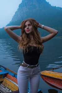 1440x2960 A Girl Posing On A Boat By The Lake