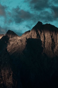 A Rocky Mountain With Clouds 5k (640x1136) Resolution Wallpaper