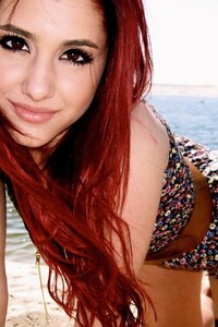 240x320 Ariana Grande Red Hairs 2