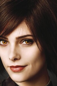 Ashley Greene Yellow Eyes (1440x2560) Resolution Wallpaper