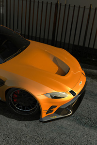 Aston Martin Vantage Mp6 Orange 4k (360x640) Resolution Wallpaper