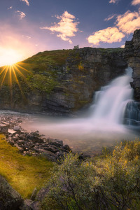 Beautiful Waterfall And Sunrise