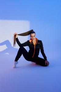 Black And Orange Tracksuit Model Posing (360x640) Resolution Wallpaper