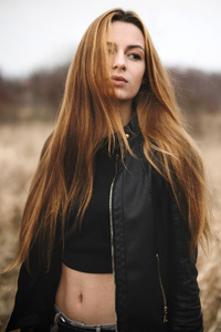 1280x2120 Black Leather Jacket Redhead Long Hairs On Face