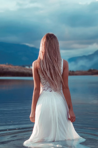 Blonde Girl Long Hair White Dress Walking In Lake (2160x3840) Resolution Wallpaper