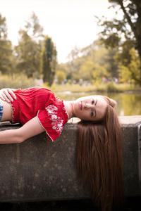 640x1136 Blonde Girl Lying Down Looking At Viewer