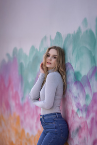 Blonde Girl Model Standing Aside Wall (640x1136) Resolution Wallpaper