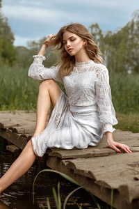 540x960 Blonde Girl White Dress Sitting At Pond