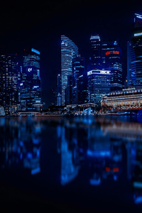 Blue Lights Reflection Water Buildings (1080x2280) Resolution Wallpaper