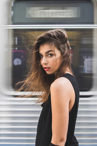 640x1136 Brunette Girl Hair Blowing Subway