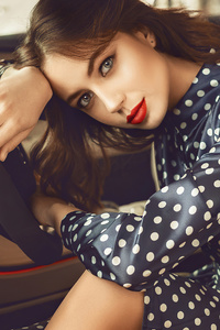 Brunette Model Sitting In Car Looking At Viewer 4k (480x800) Resolution Wallpaper