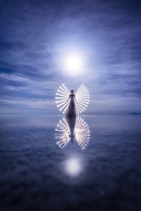Brushstrokes Of Light Capturing A Girl In White Dress Presence (640x960) Resolution Wallpaper