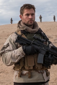 Chris Hemsworth In 12 Strong Movie (1125x2436) Resolution Wallpaper