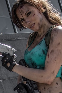 Cosplay Of Lara Croft (1080x2160) Resolution Wallpaper