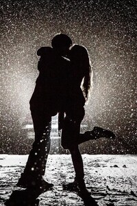 Couple Kissing in Snow