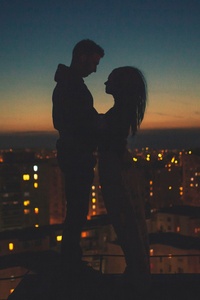 Couple Silhouette City View Behind