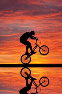 Cycling Sunset (540x960) Resolution Wallpaper