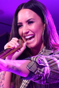 Demi Lovato Singing (240x400) Resolution Wallpaper