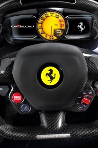 Ferrari Steering (750x1334) Resolution Wallpaper