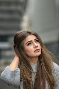 Girl Embracing Winter Warmth In Grey Sweater (360x640) Resolution Wallpaper