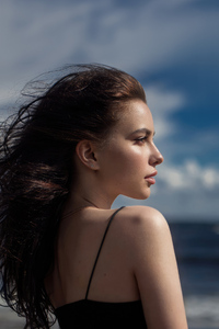 Girl Feeling The Ocean Breeze Outdoors (480x854) Resolution Wallpaper