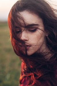 Girl Hairs On Face Portrait (240x320) Resolution Wallpaper