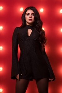 Girl In Black Dress Red Background (640x960) Resolution Wallpaper