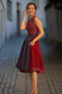 Girl In Red Dress Grins At The Camera (240x320) Resolution Wallpaper