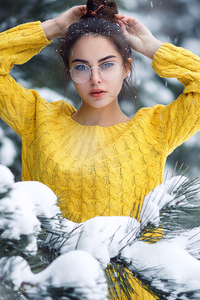 Girl In Snow Looking At Viewer (1080x2160) Resolution Wallpaper