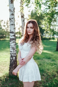 Girl In White Dress Outdoors