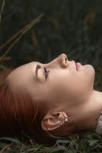 Girl Lying Down Looking Up (480x854) Resolution Wallpaper