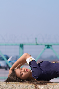 Girl Lying Down On The Bridge Side (240x400) Resolution Wallpaper