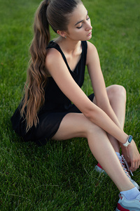 Girl Model Sitting On Grass Long Hair 4k (640x960) Resolution Wallpaper