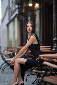 Girl Outdoor Sitting On A Bench Looking Away 4k (240x320) Resolution Wallpaper