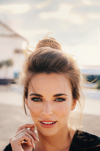 Girl Starring At Viewer Smiling (1080x2280) Resolution Wallpaper