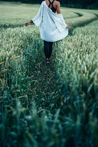 Girl Walking In Field Way