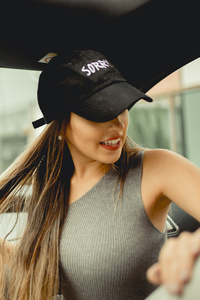 Girl With Basketball Cap In Car (480x800) Resolution Wallpaper