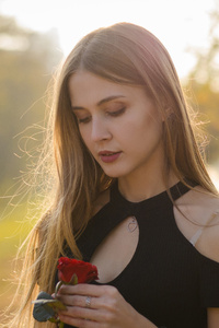 Girl With Red Rose In Hand 4k (540x960) Resolution Wallpaper