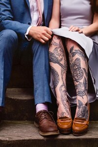 Girl With Tattoos On Legs